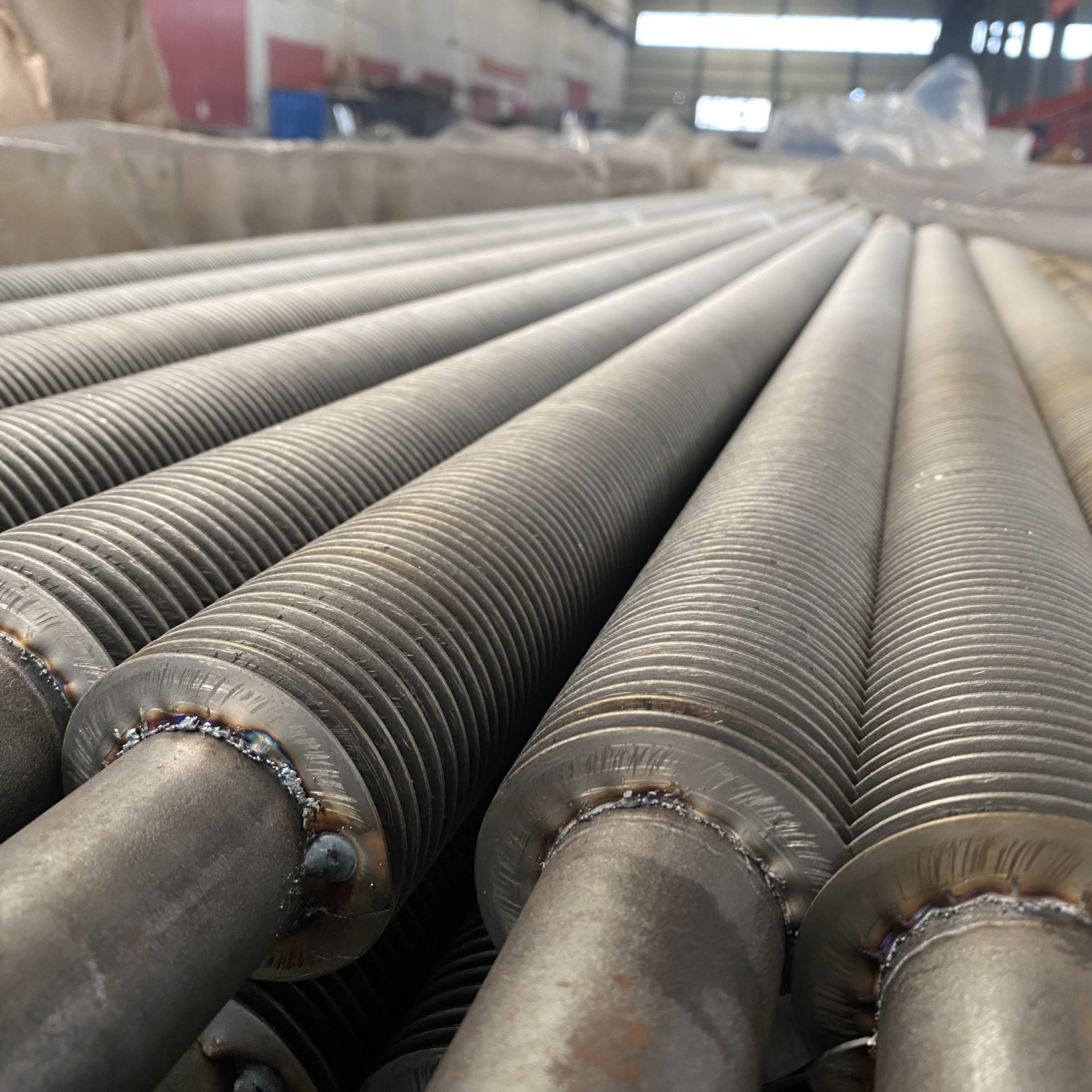 Helical finned tube for heat exchanger